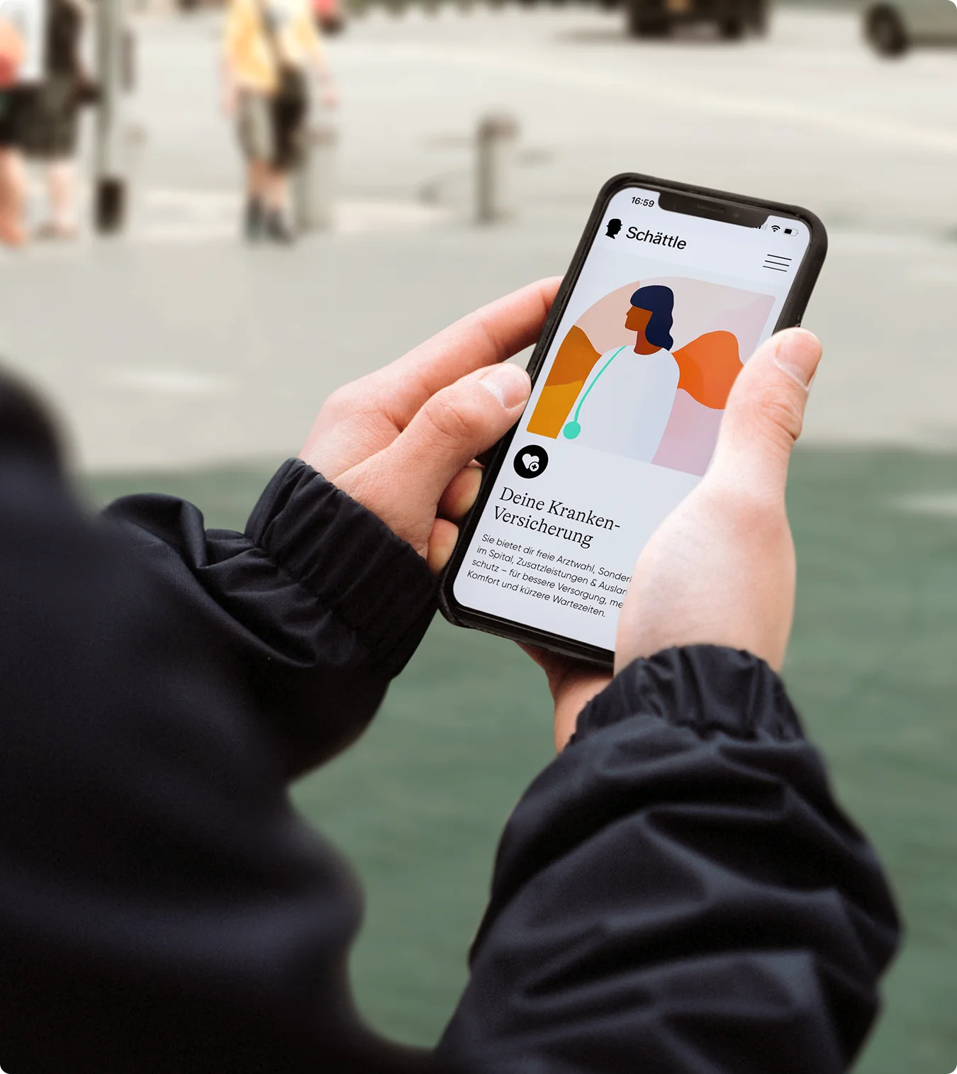 Hand hält ein Smartphone mit der neuen Schättle-Website